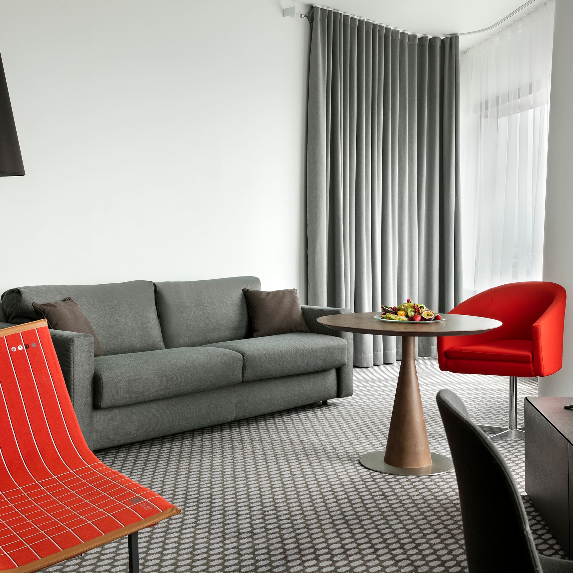 a living room with a couch and a table