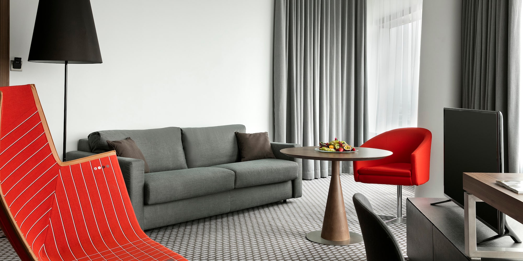 a living room with a couch and a table