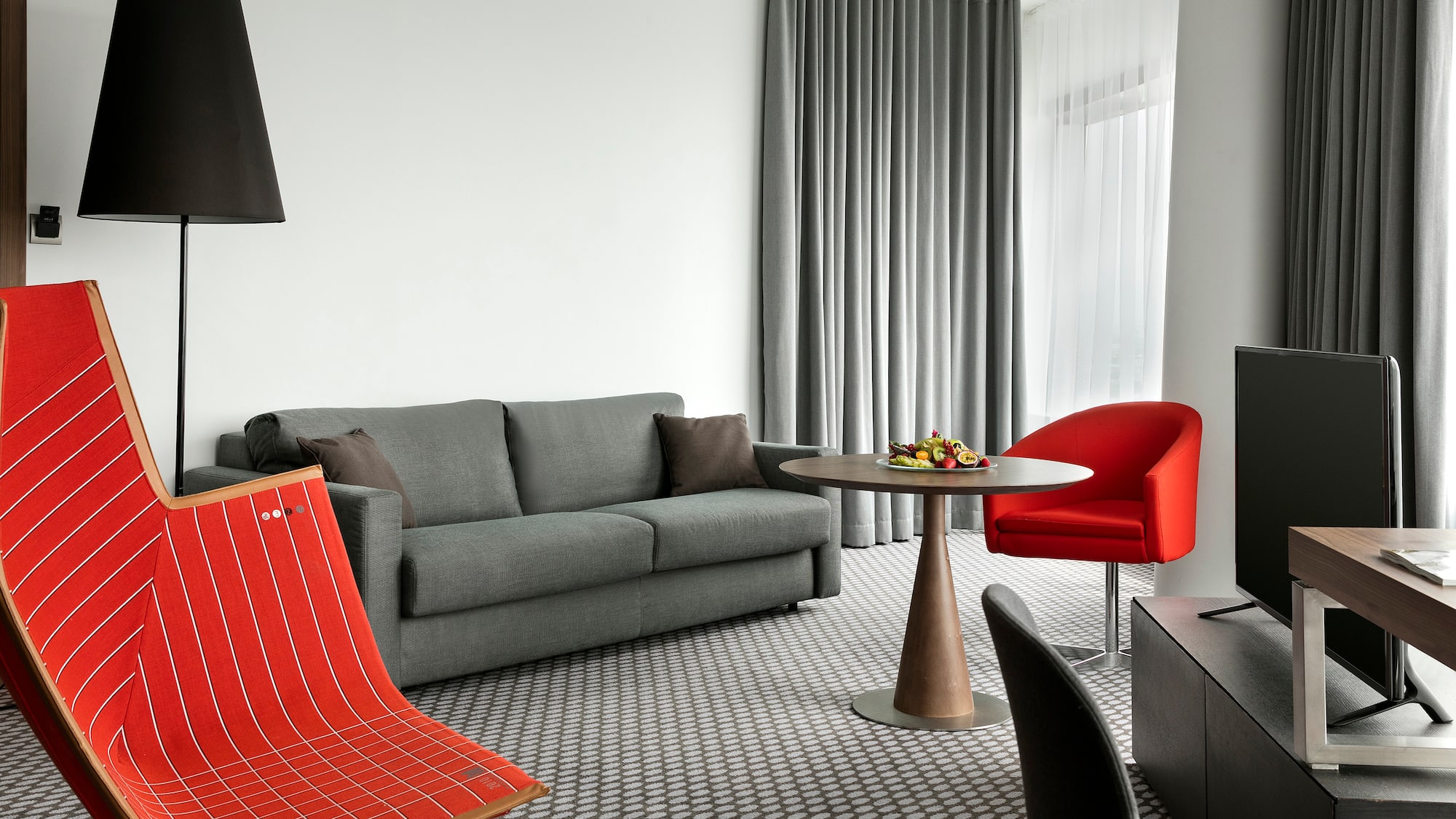 a living room with a couch and a table