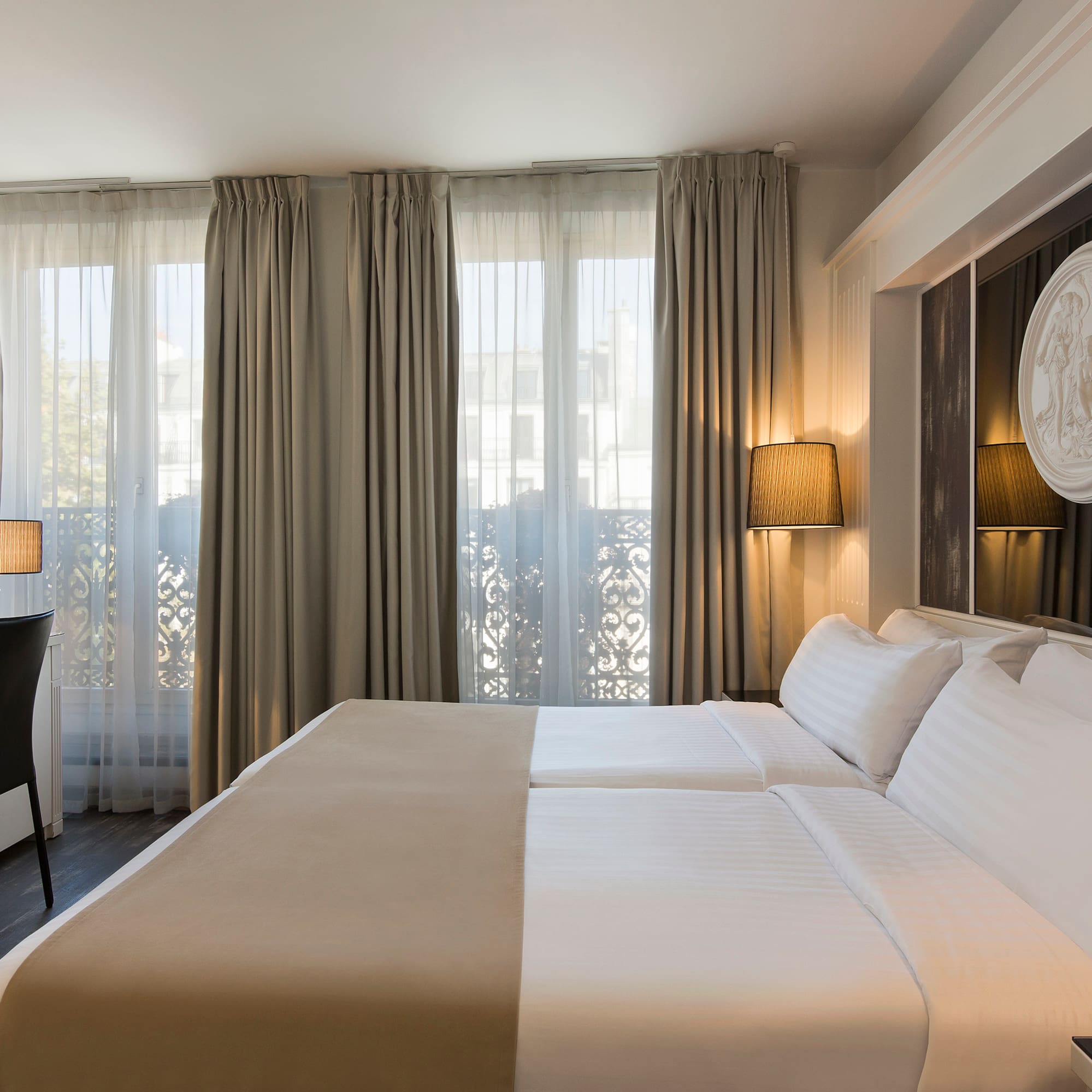 a room with a bed and a desk