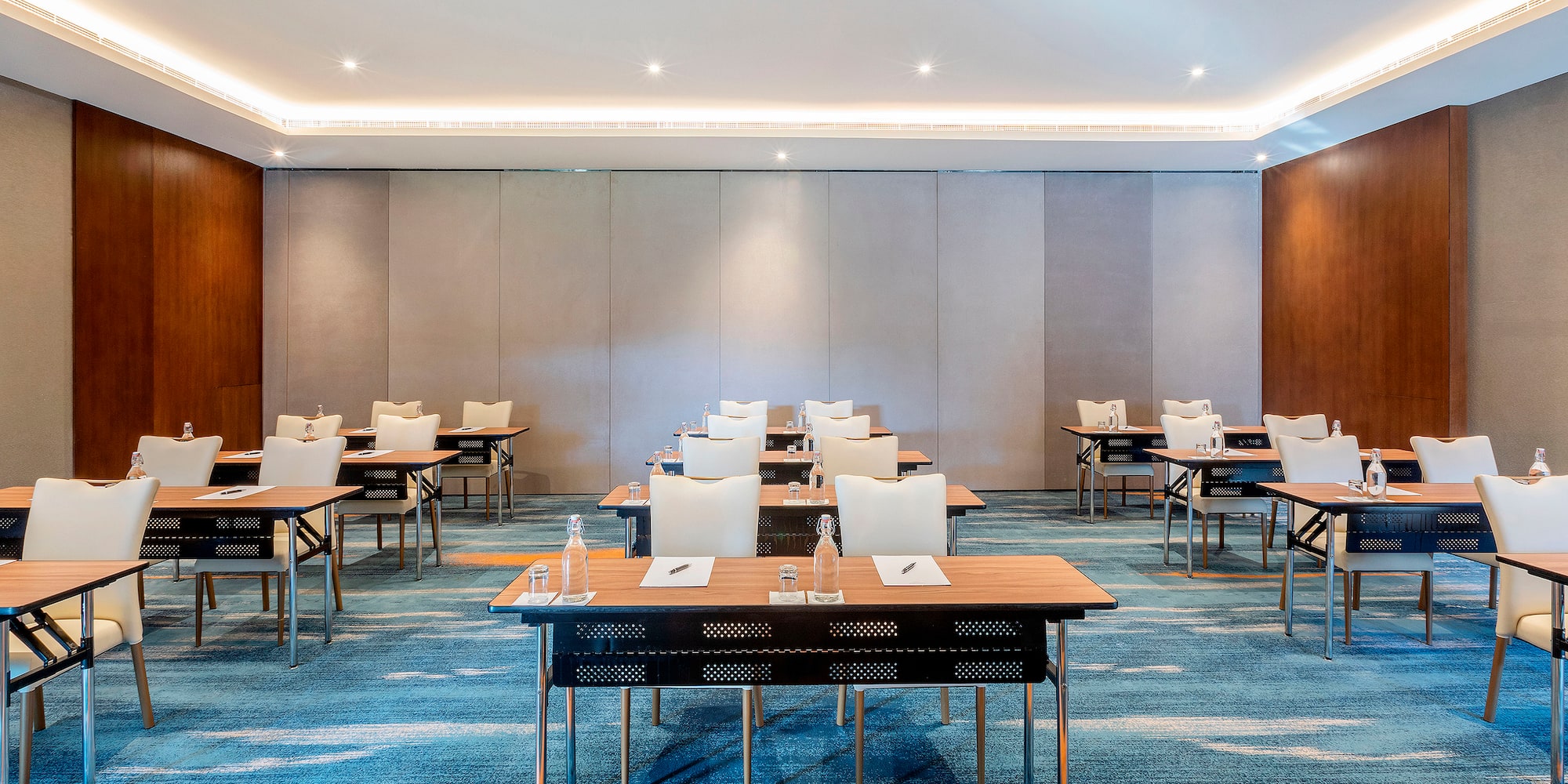 a room with tables and chairs