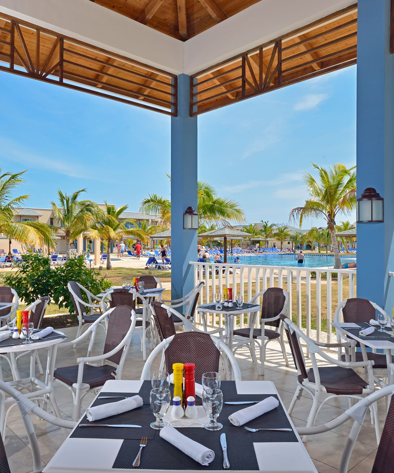 a restaurant with tables and chairs