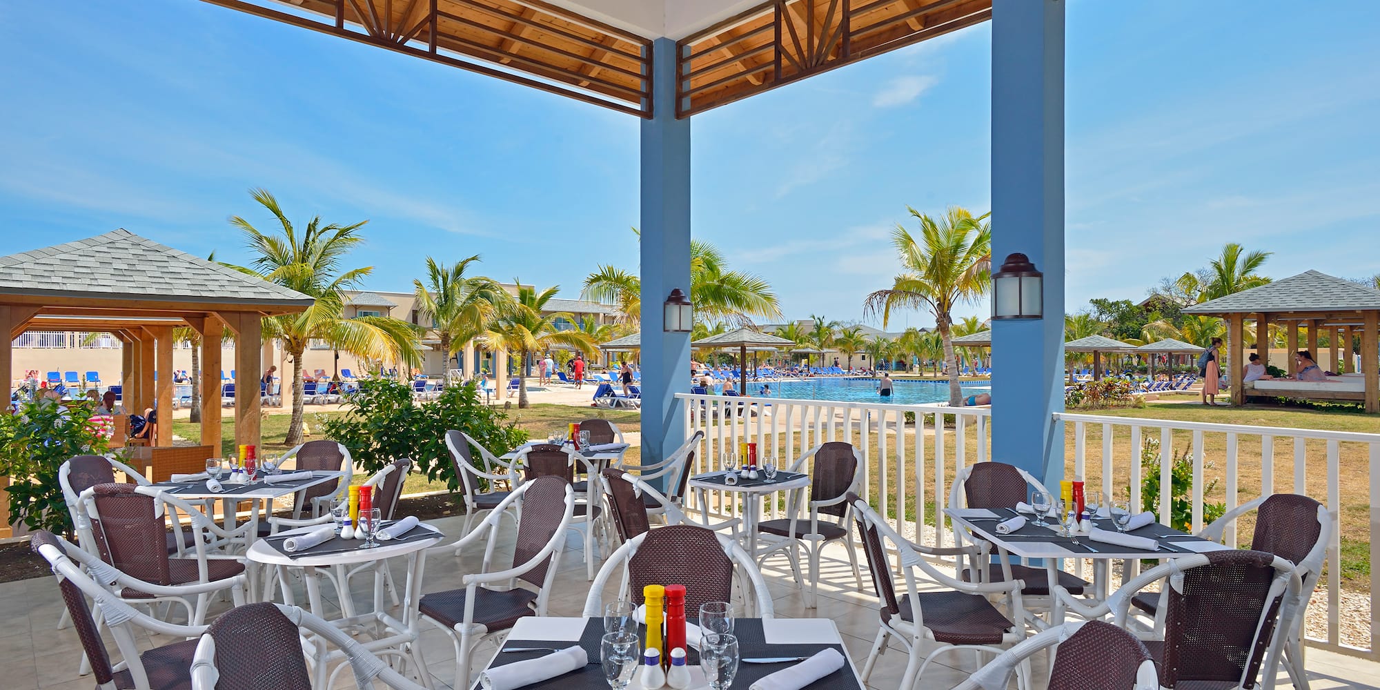 a restaurant with tables and chairs