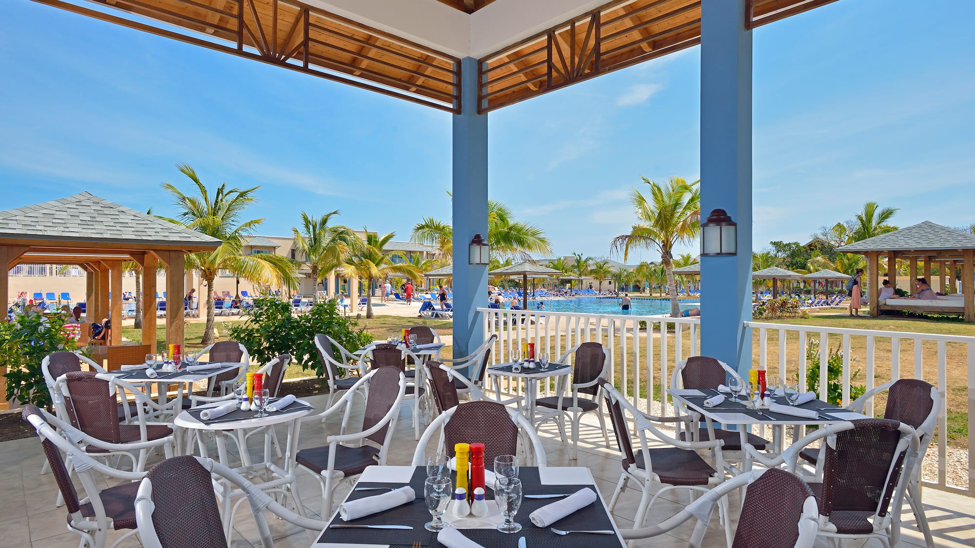 a restaurant with tables and chairs