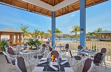 a restaurant with tables and chairs