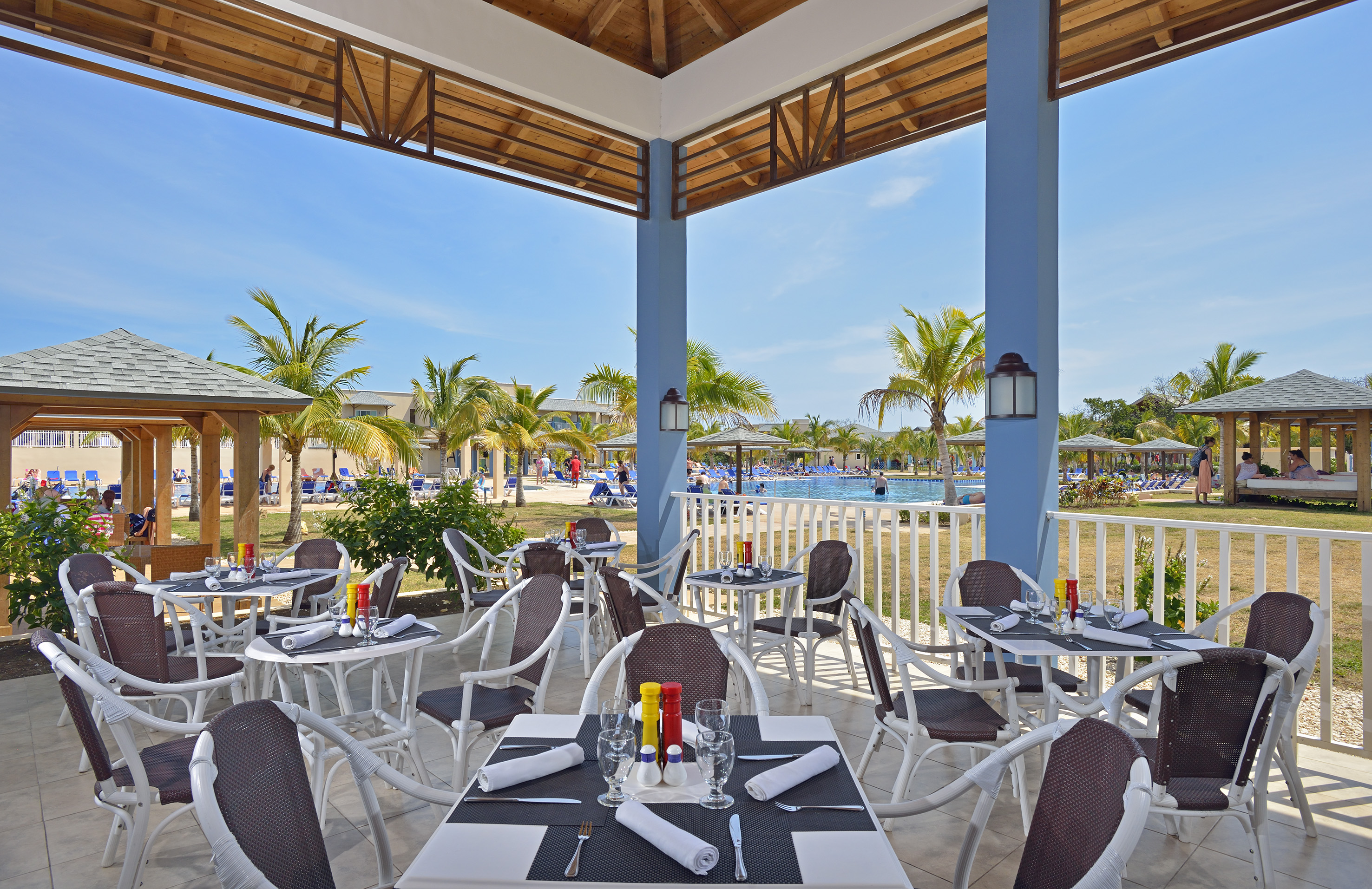 a restaurant with tables and chairs