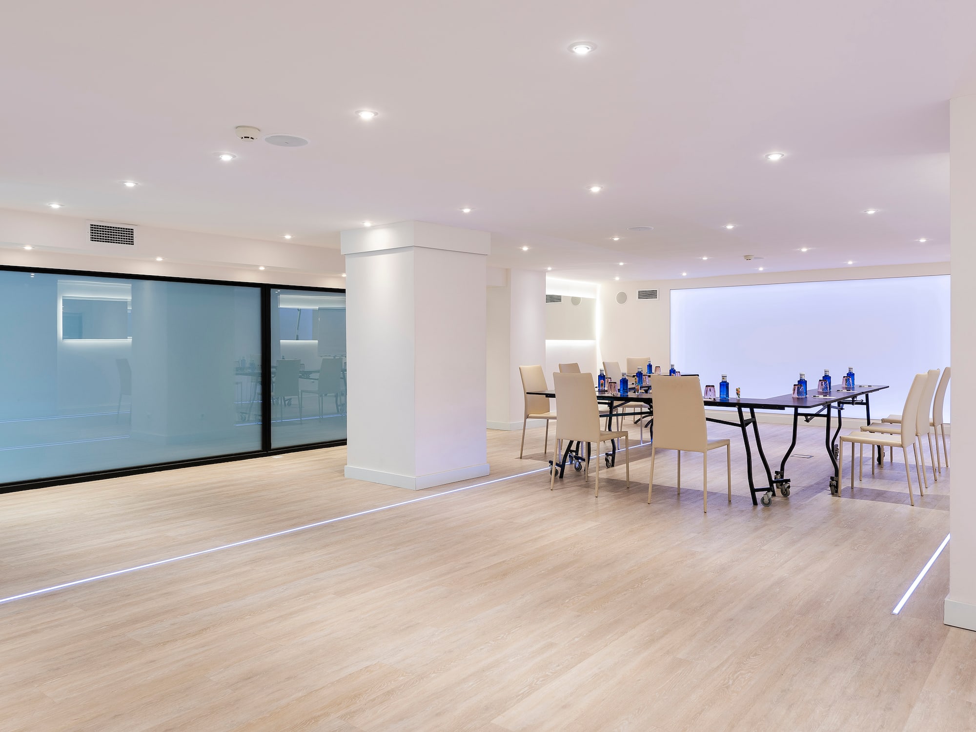 a room with a table and chairs