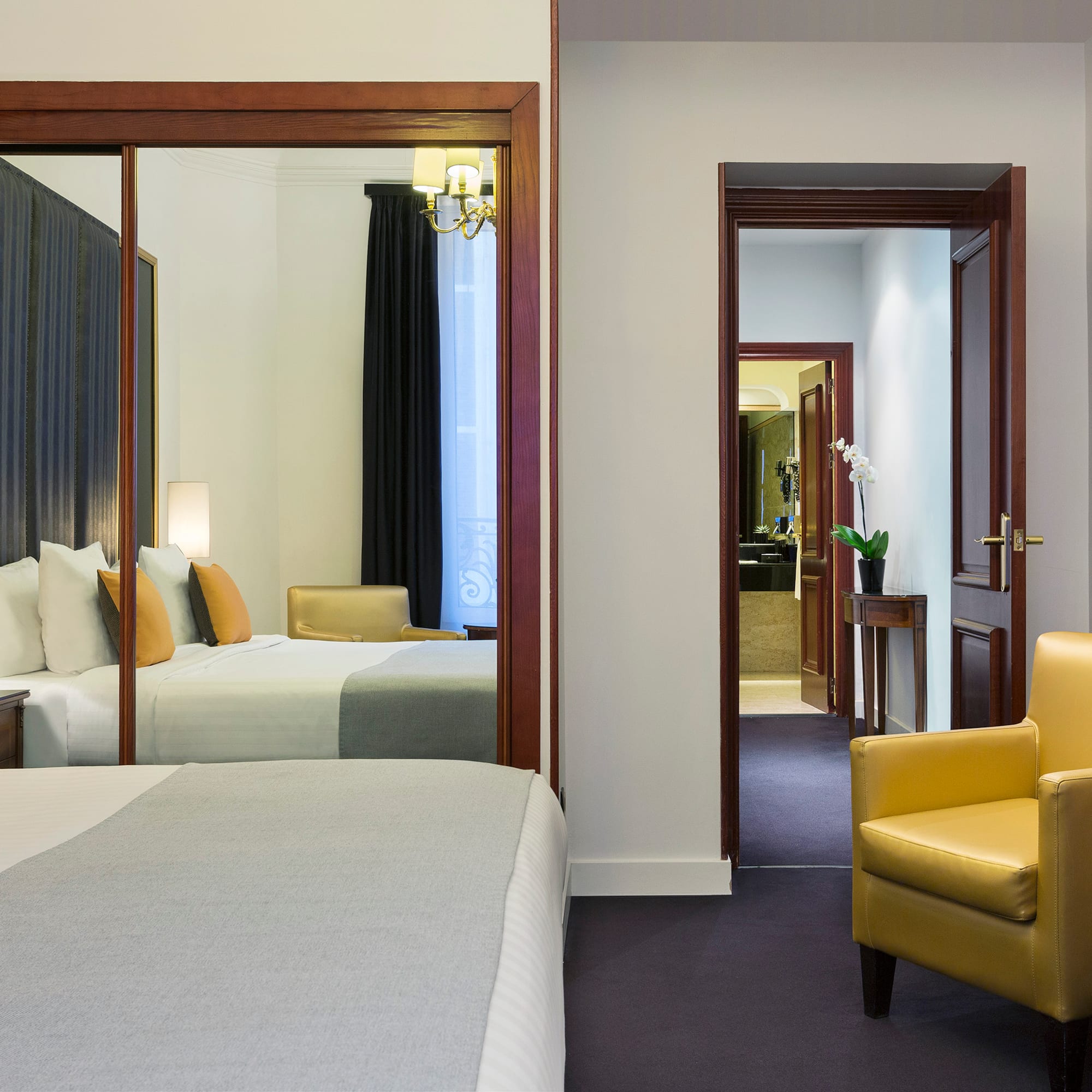 a room with a bed and a chair