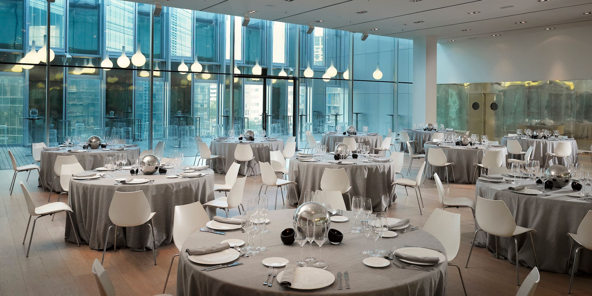 a large room with tables and chairs