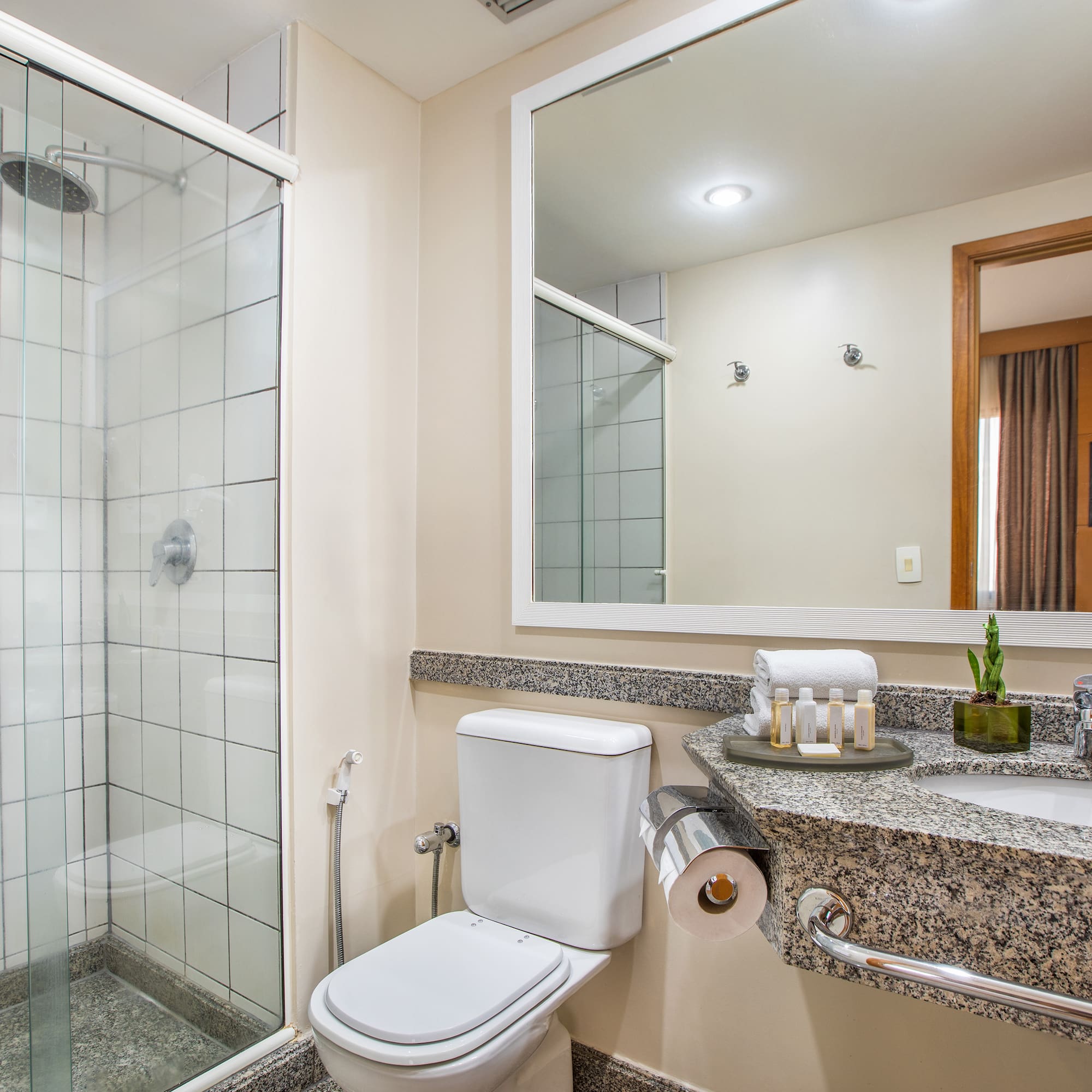 a bathroom with a sink and shower