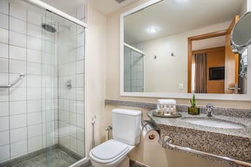 a bathroom with a sink and shower