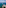 Benidorm viewpoint with sea fountain, pedal boats, and Benidorm Island.