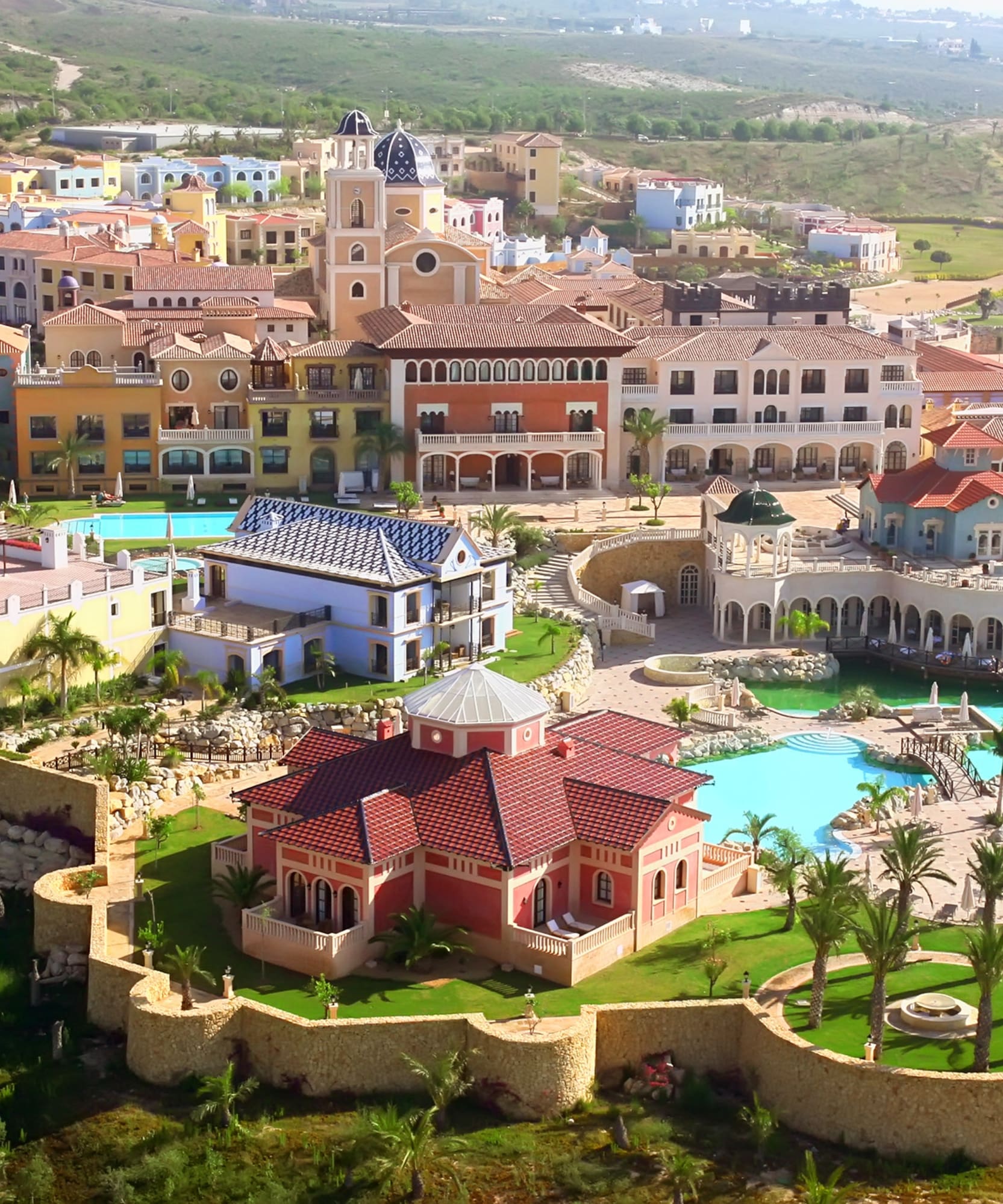 a large town with a pool and a building