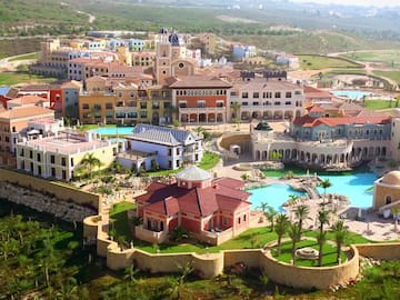 a large town with a pool and a building