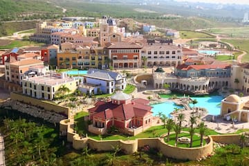 a large town with a pool and a building