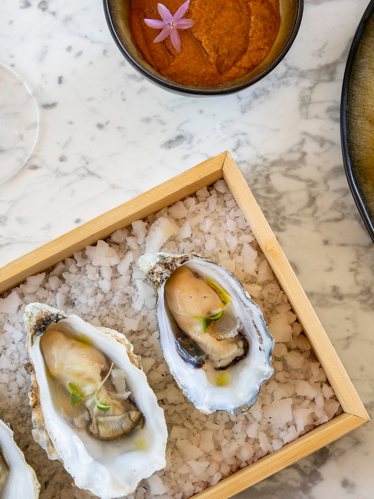 a plate of food on a marble table