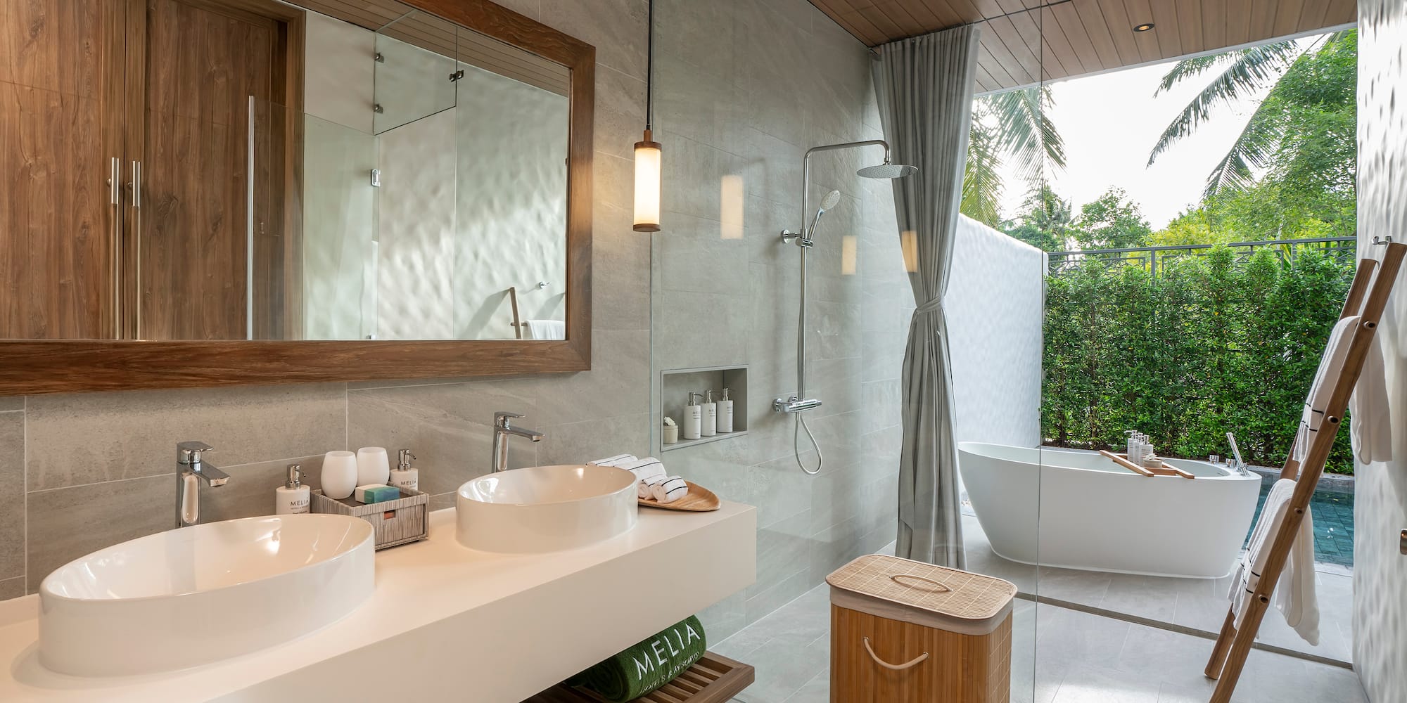 a bathroom with a tub and sink