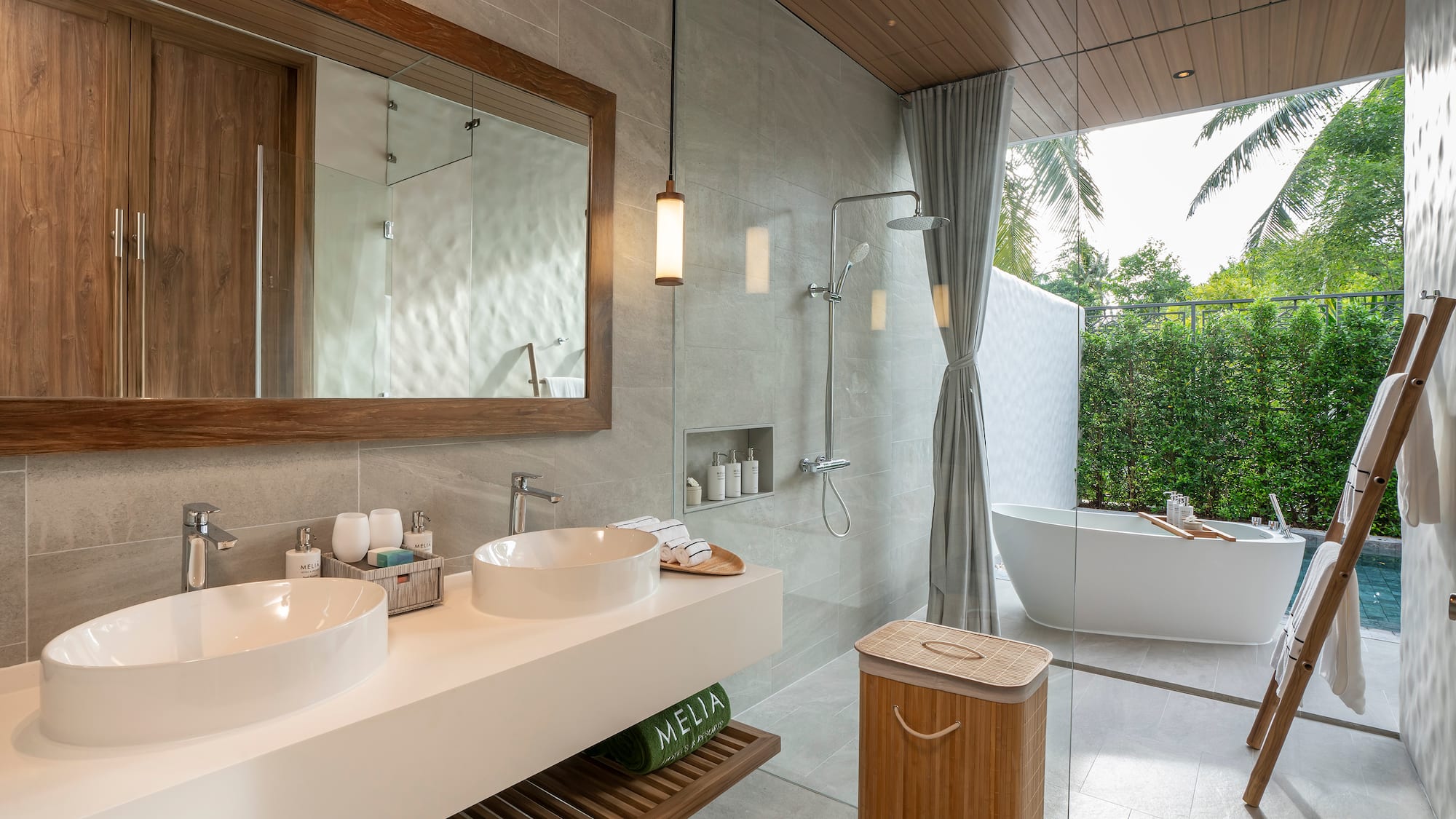 a bathroom with a tub and sink