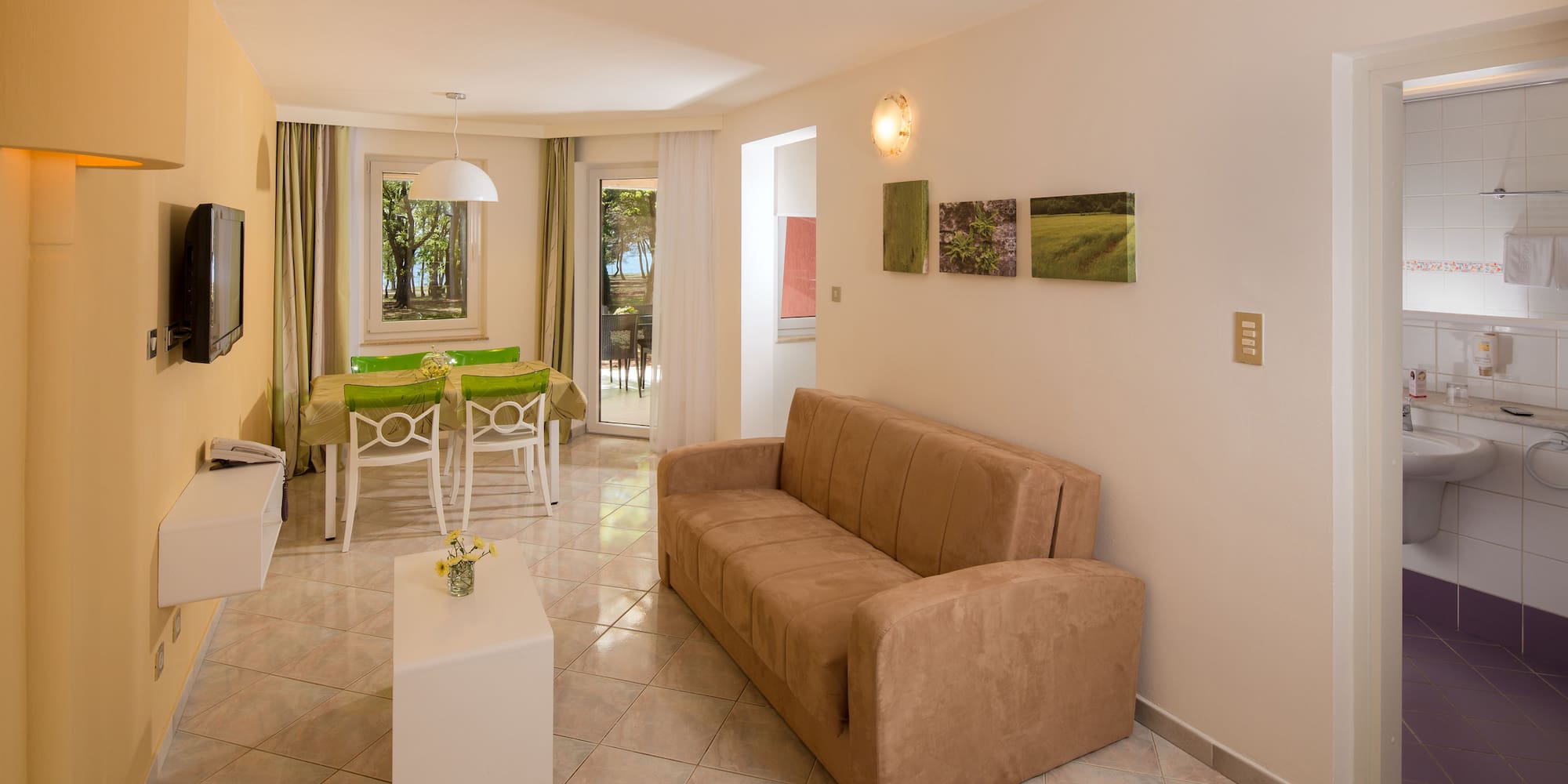 a living room with a couch and a table