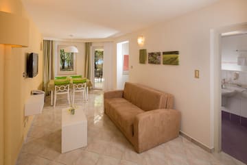 a living room with a couch and a table