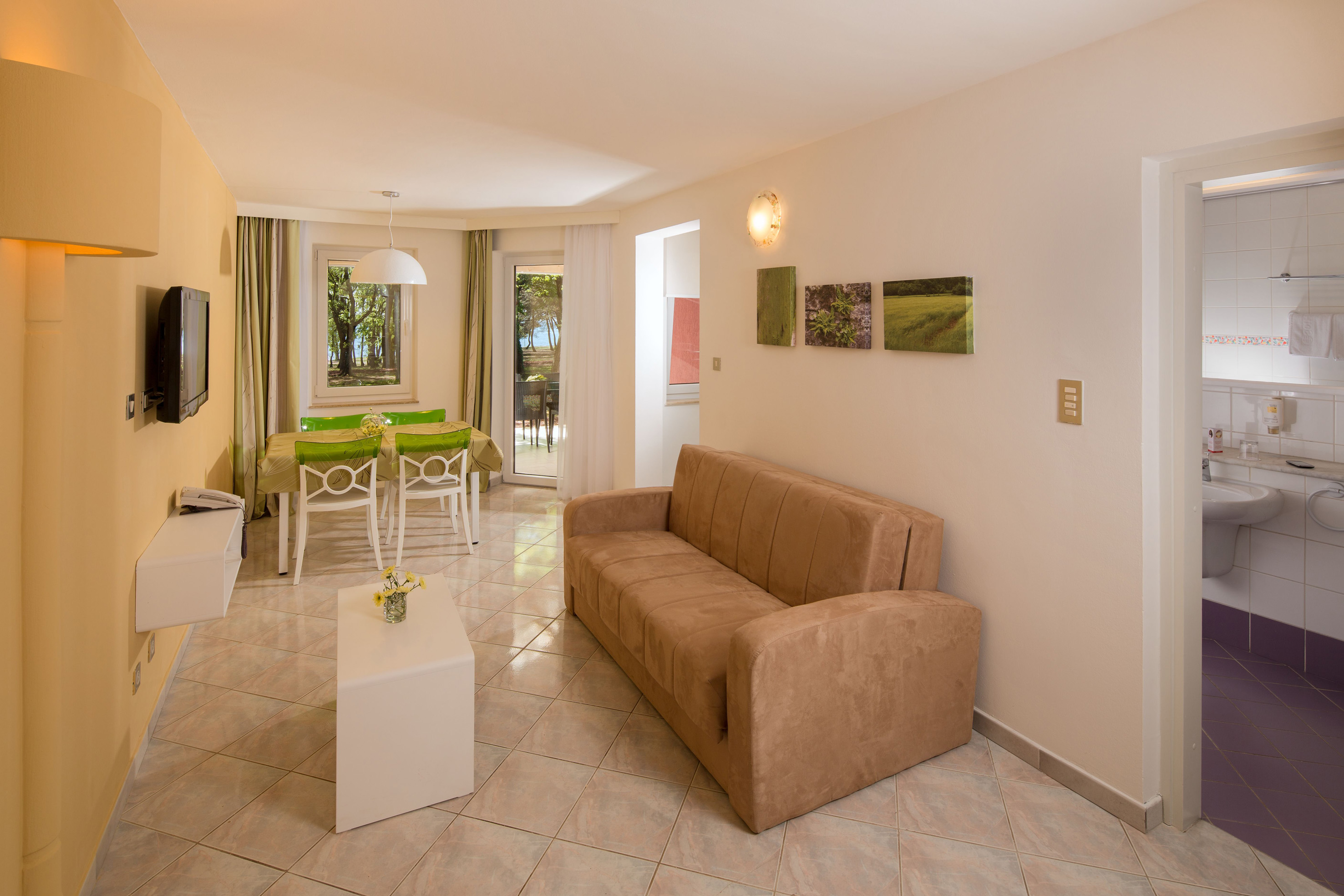 a living room with a couch and a table