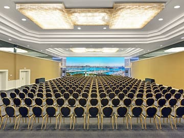 a large room with rows of chairs