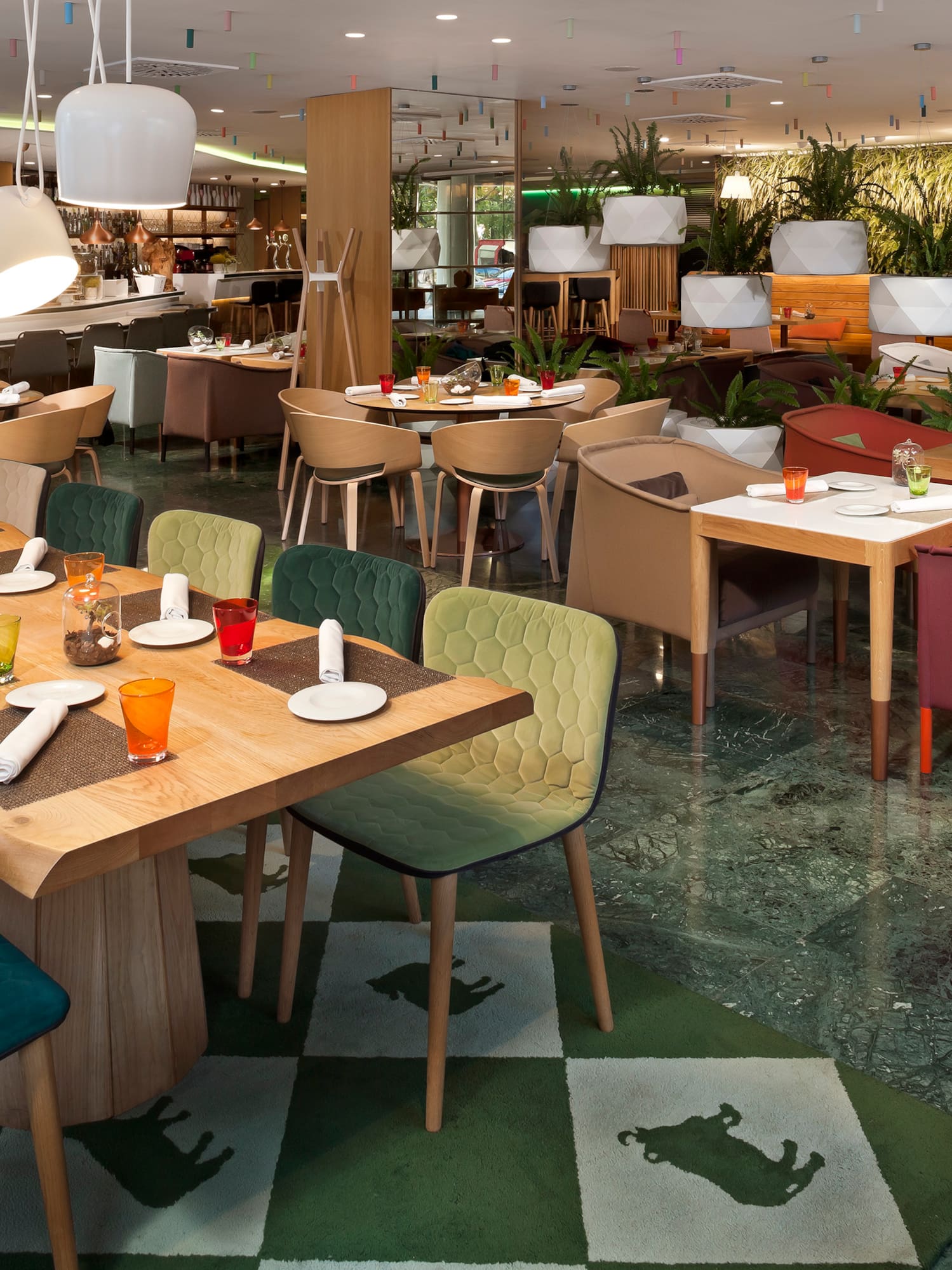 a restaurant with tables and chairs.