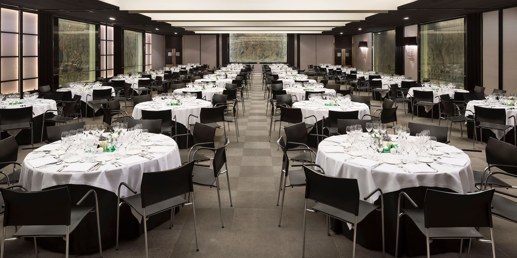 a room with tables and chairs