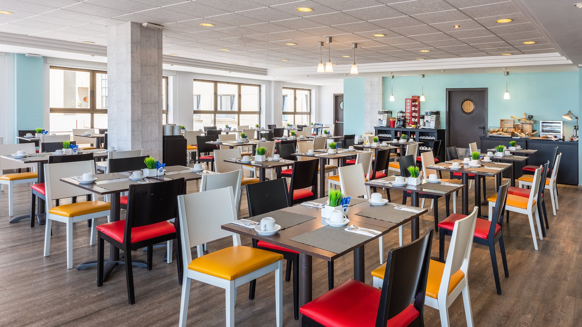 a room with tables and chairs