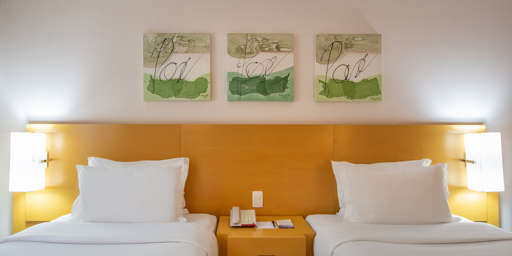 two beds in a hotel room