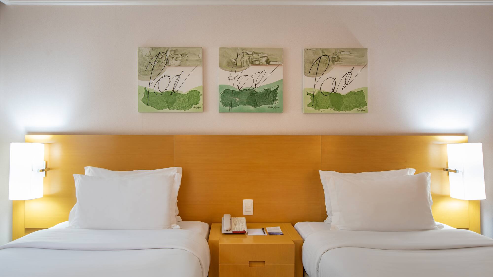 two beds in a hotel room