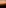 a beach with a sunset