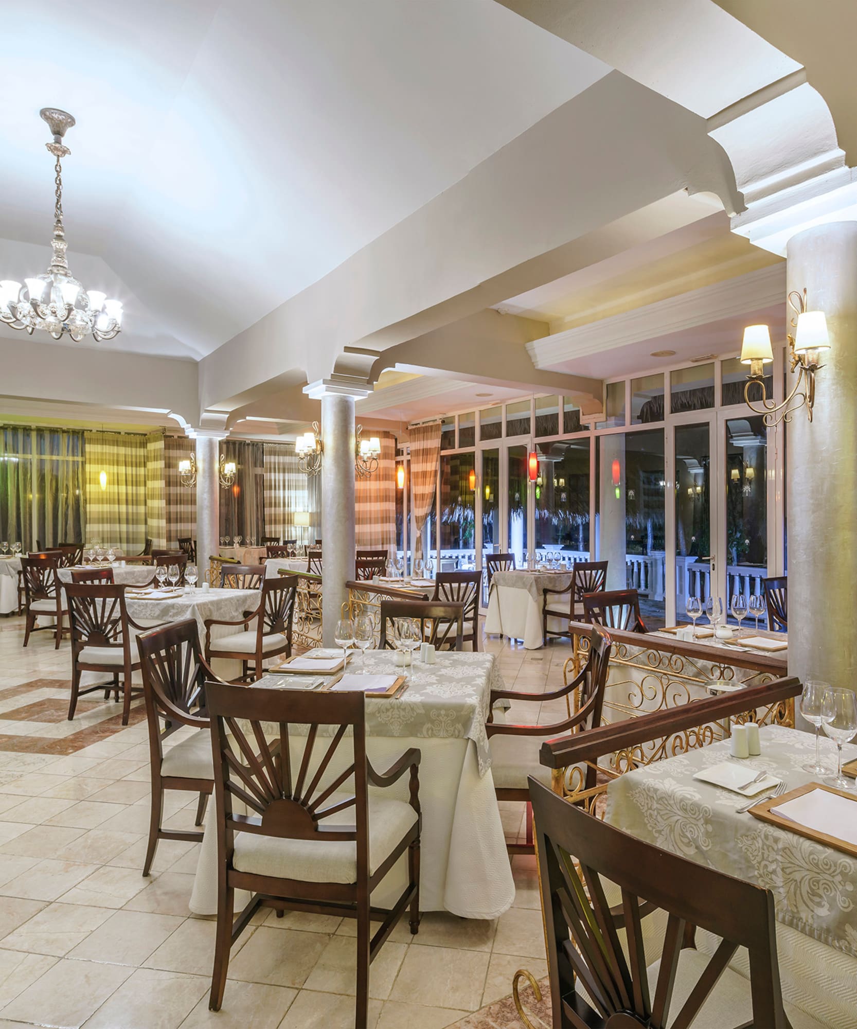 a restaurant with tables and chairs