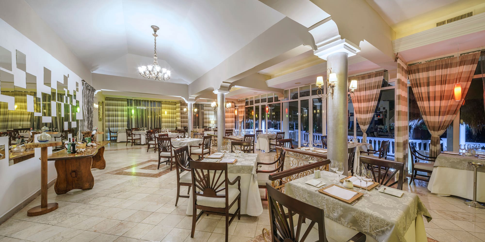a restaurant with tables and chairs