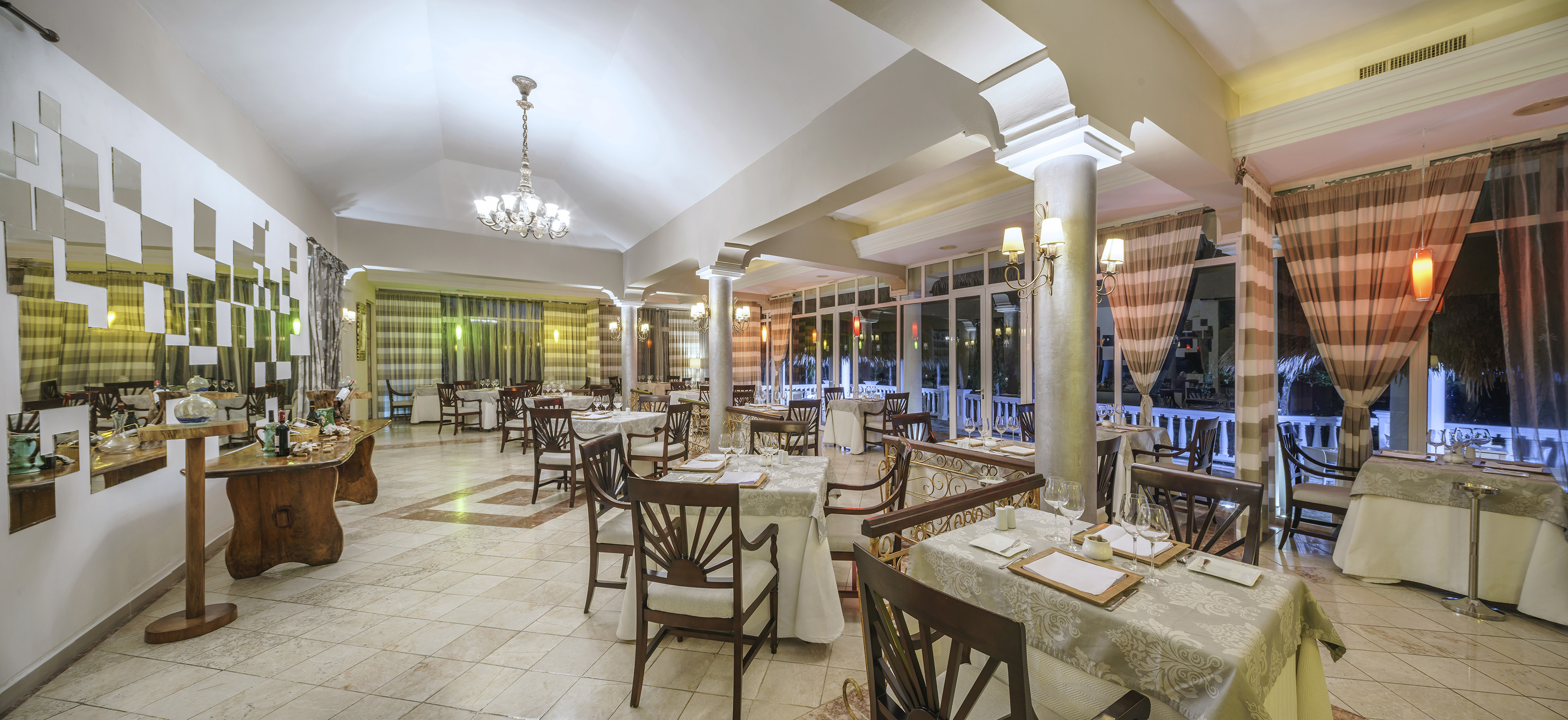a restaurant with tables and chairs