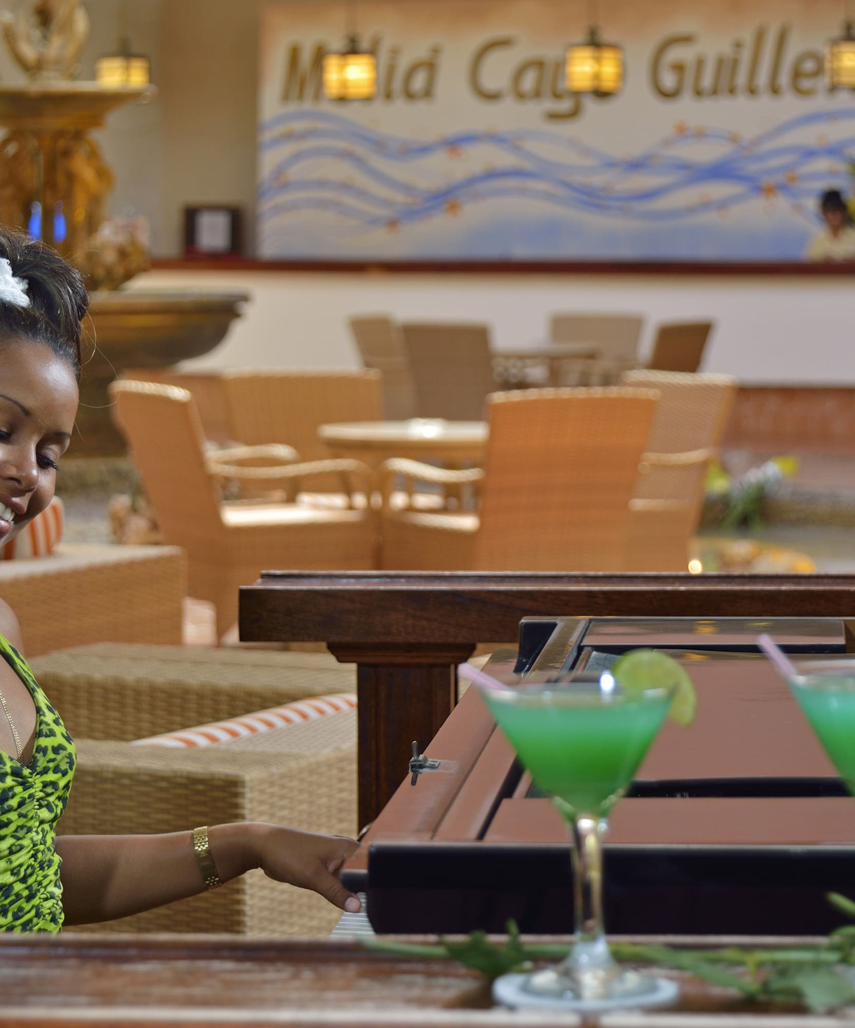 a woman playing a piano