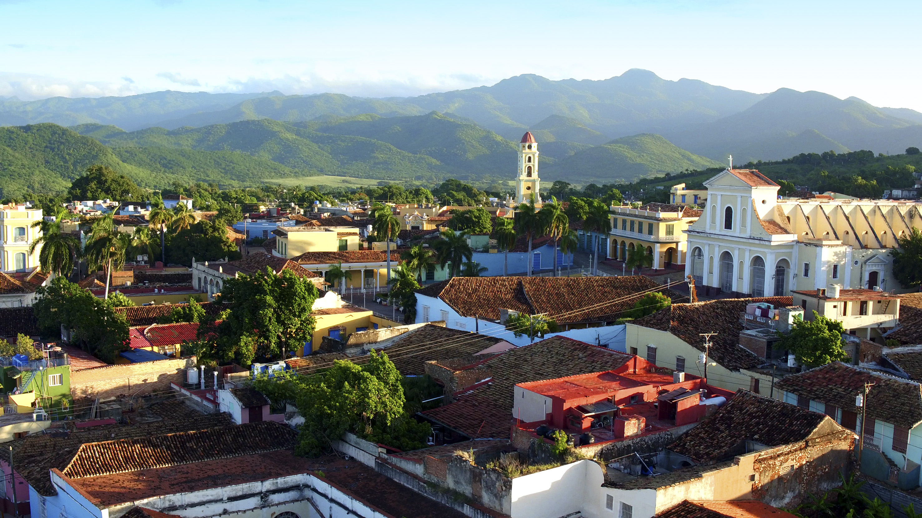 a city with many buildings and trees
