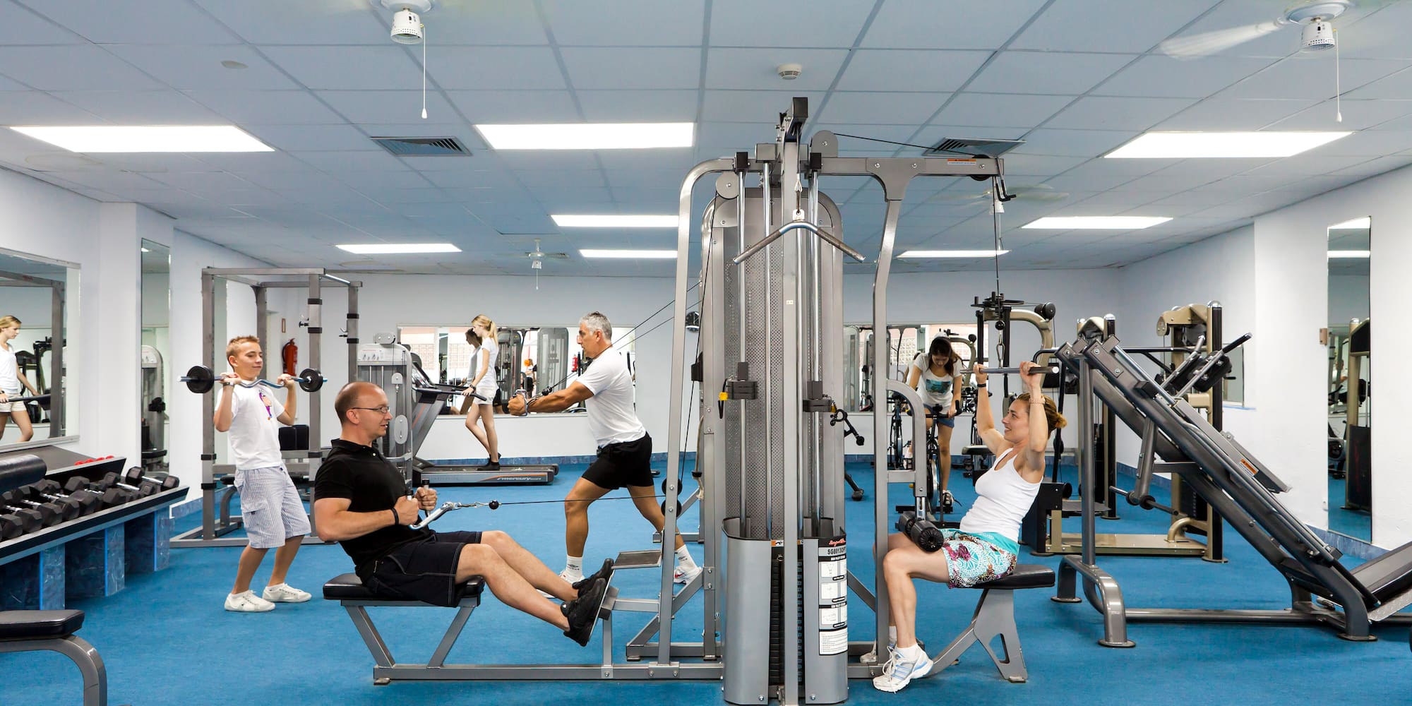 people in a gym with people working out