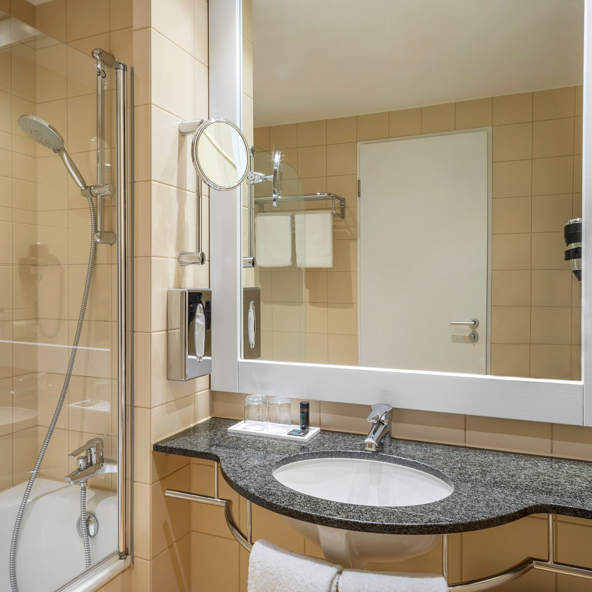 a bathroom with a mirror and sink