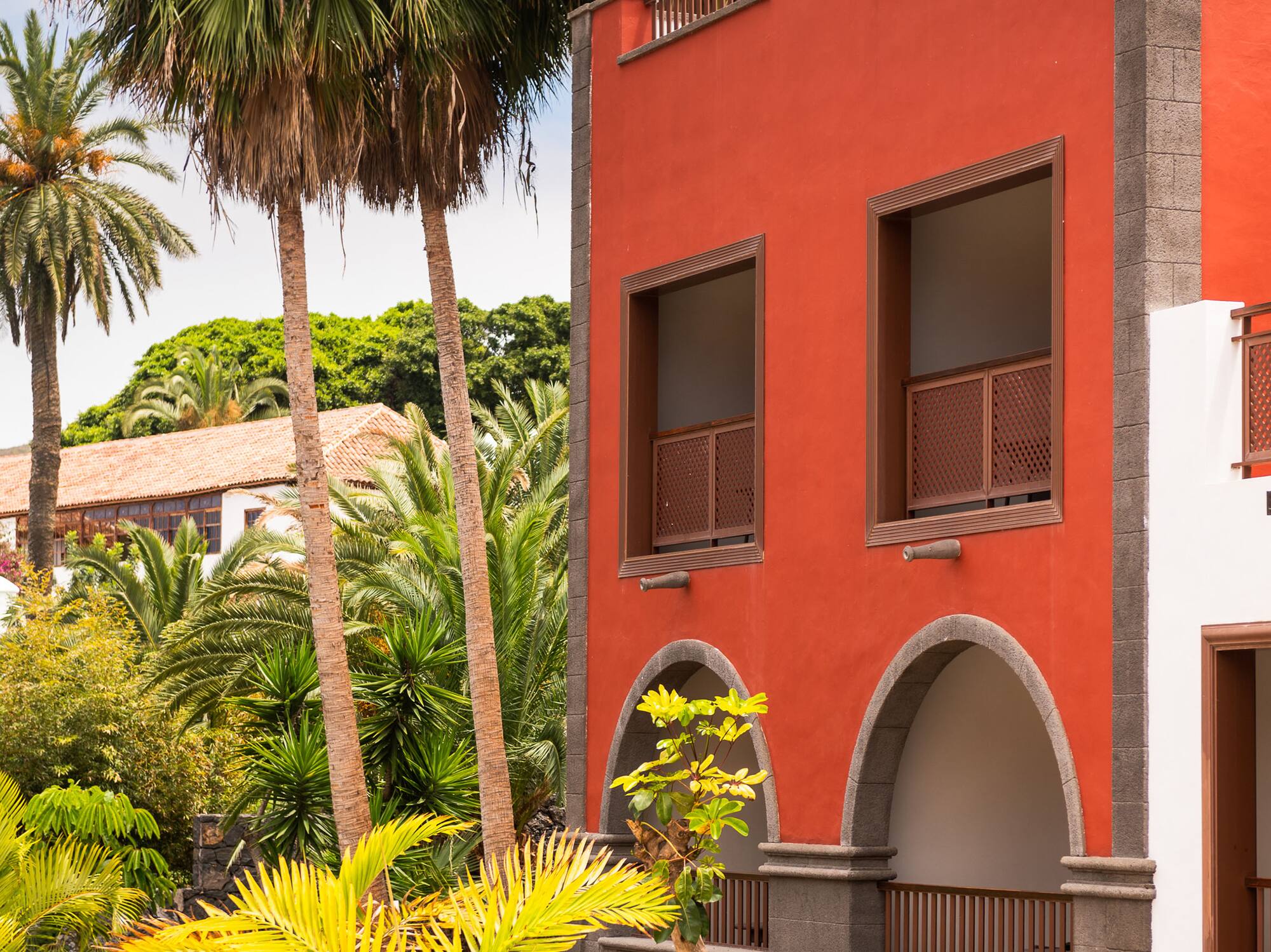 a building with palm trees