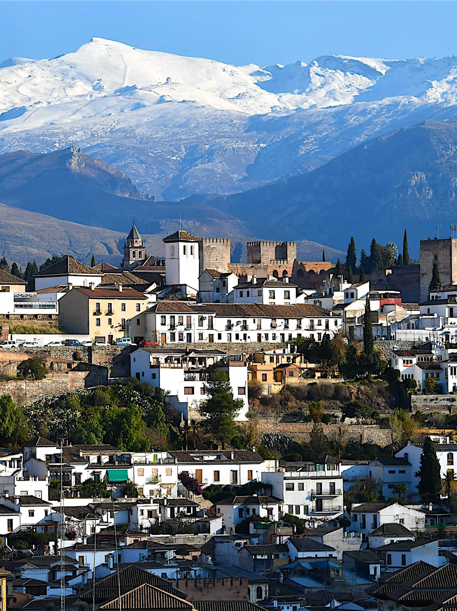 a city with a mountain in the background