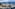 a city with a mountain in the background