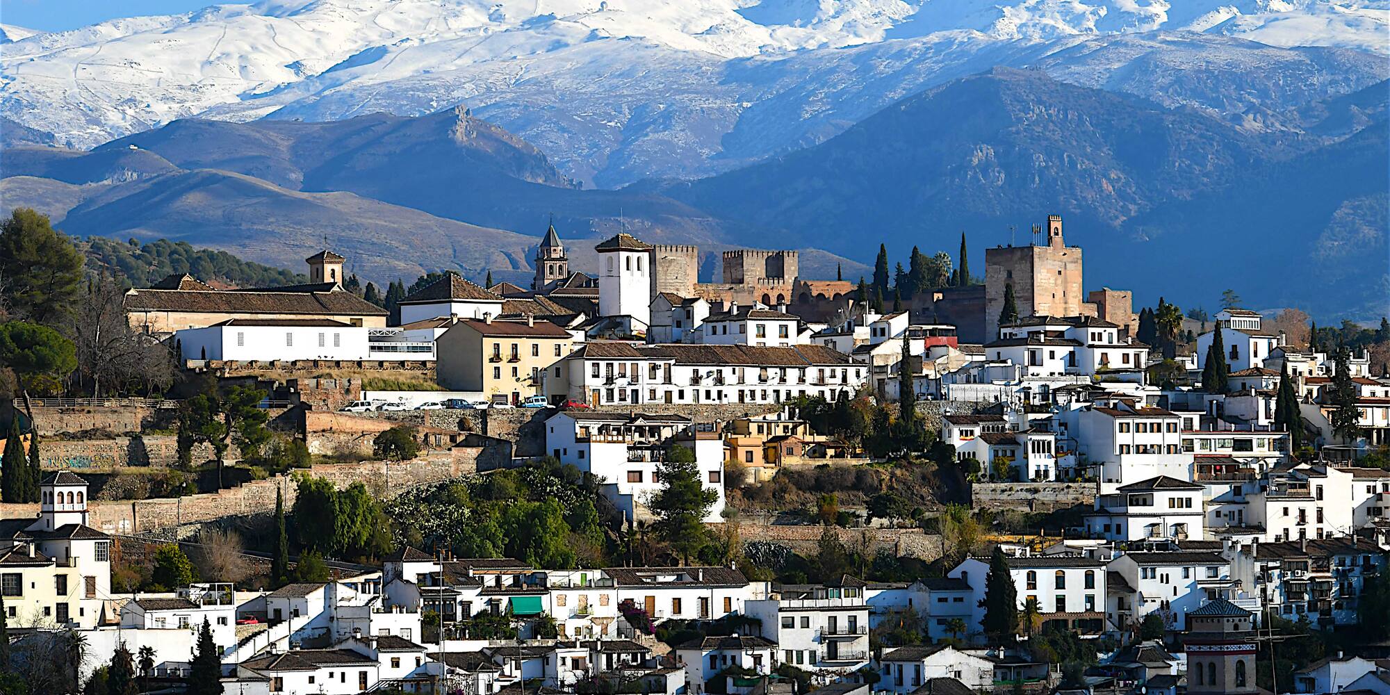 a city with a mountain in the background