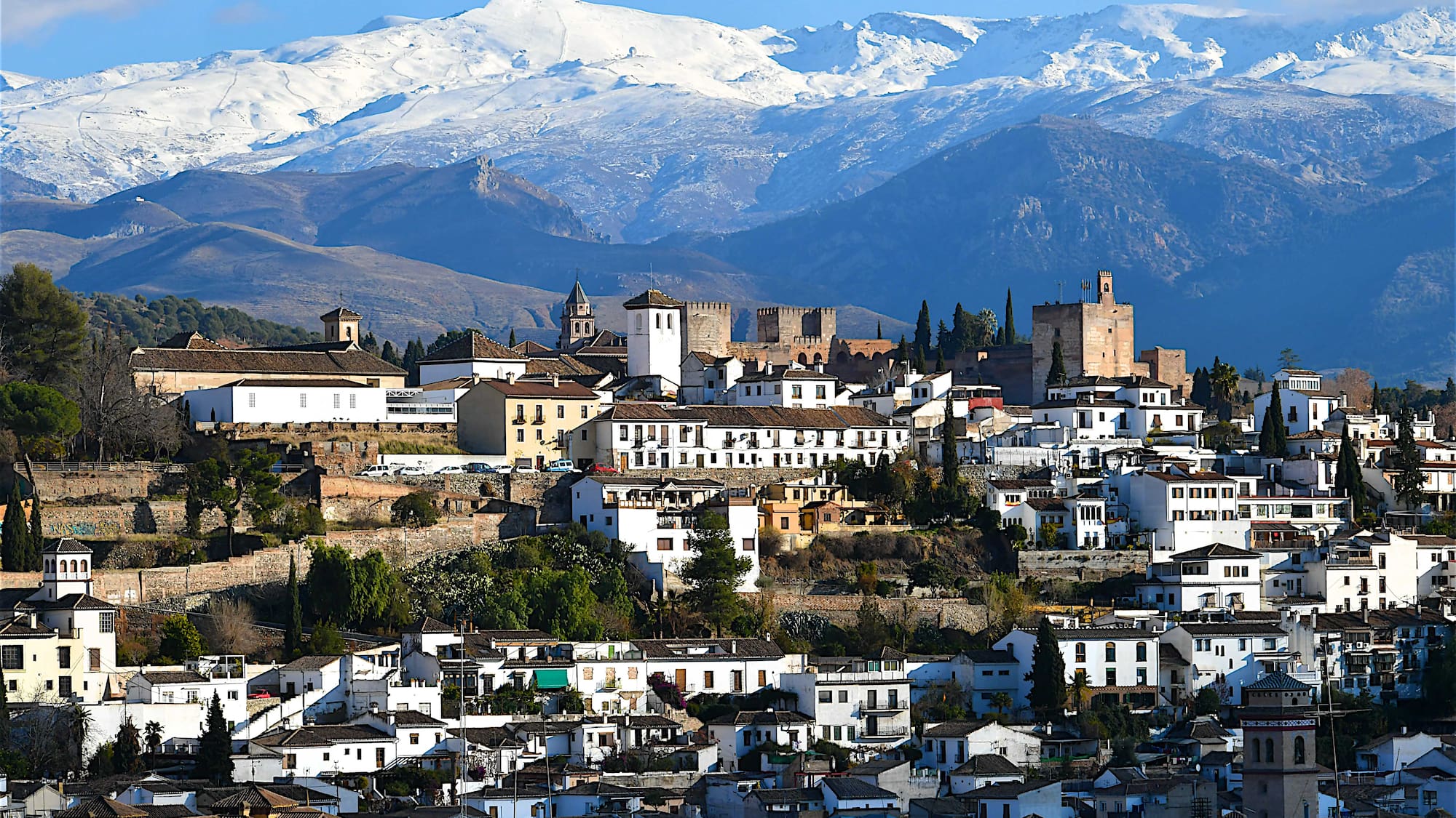 a city with a mountain in the background
