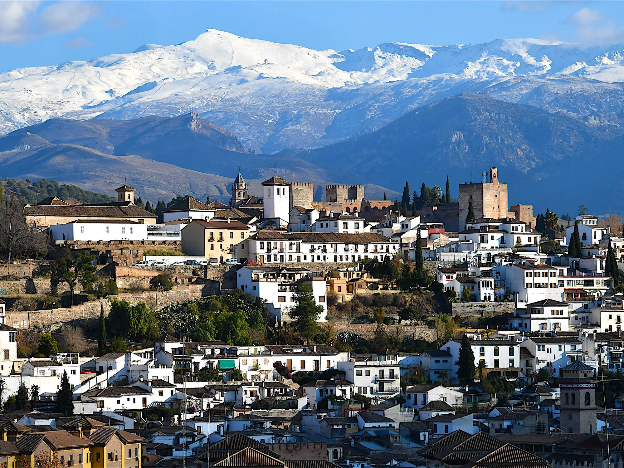 a city with a mountain in the background