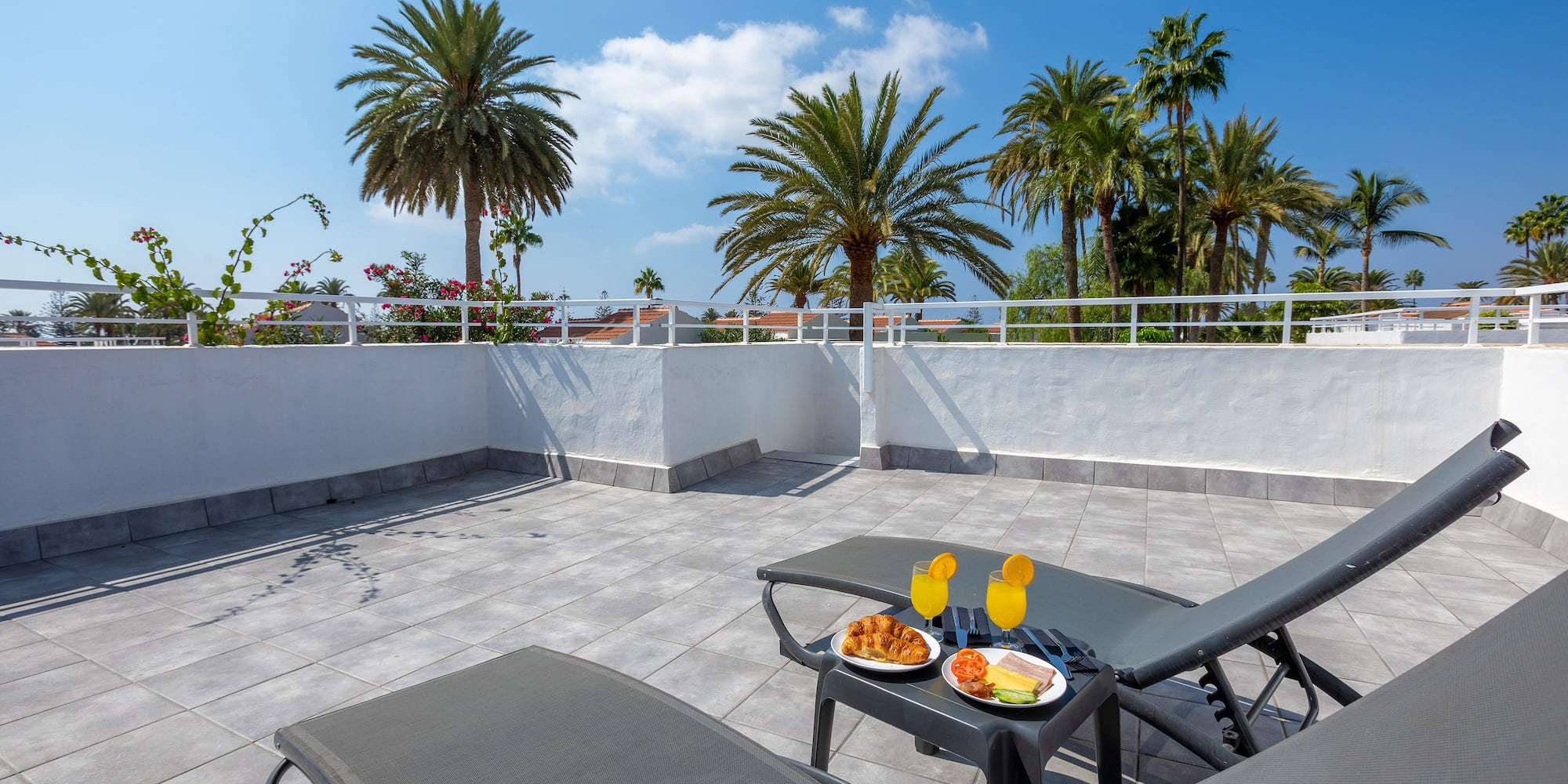 a table with food on it on a patio