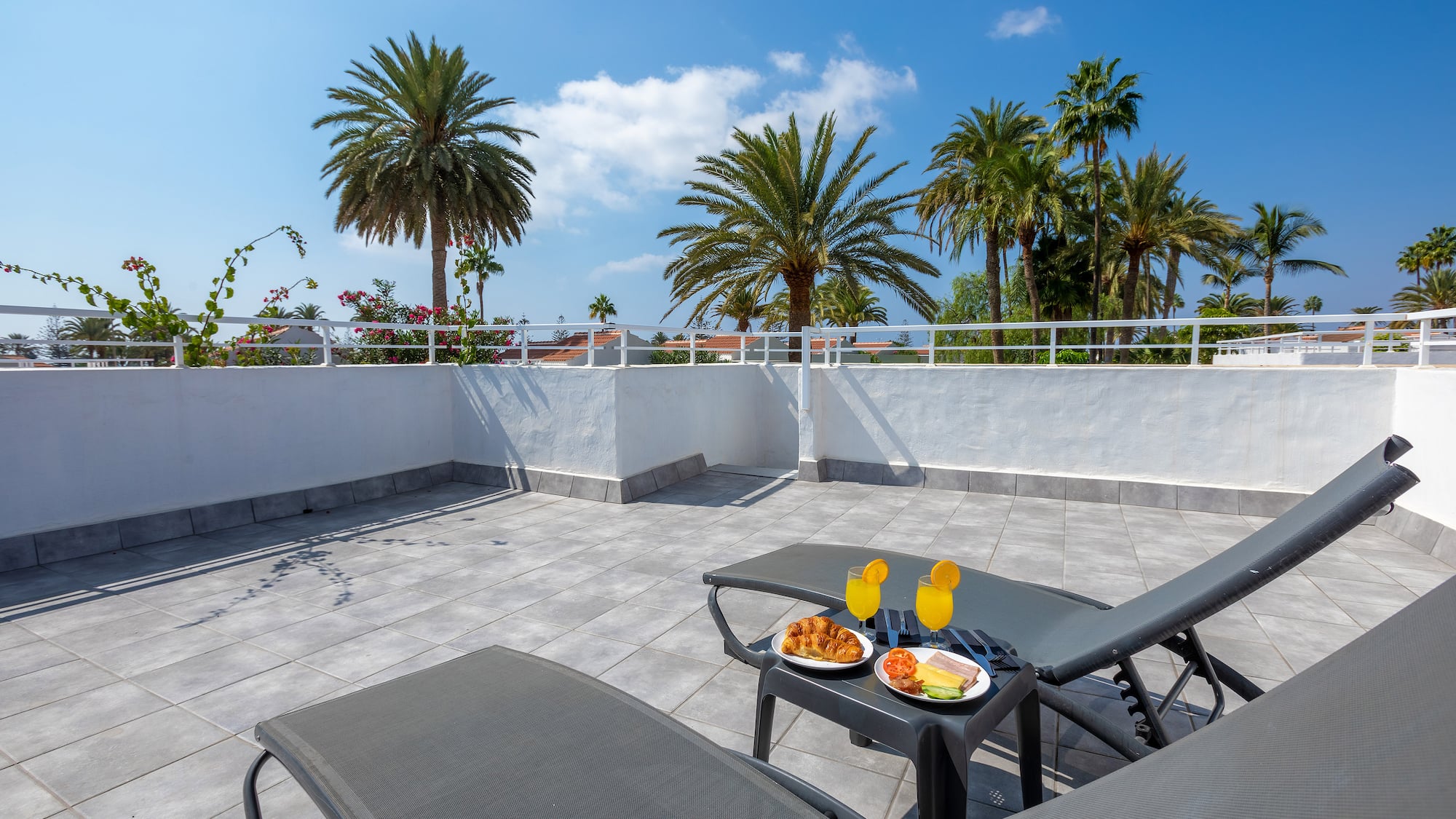 a table with food on it on a patio
