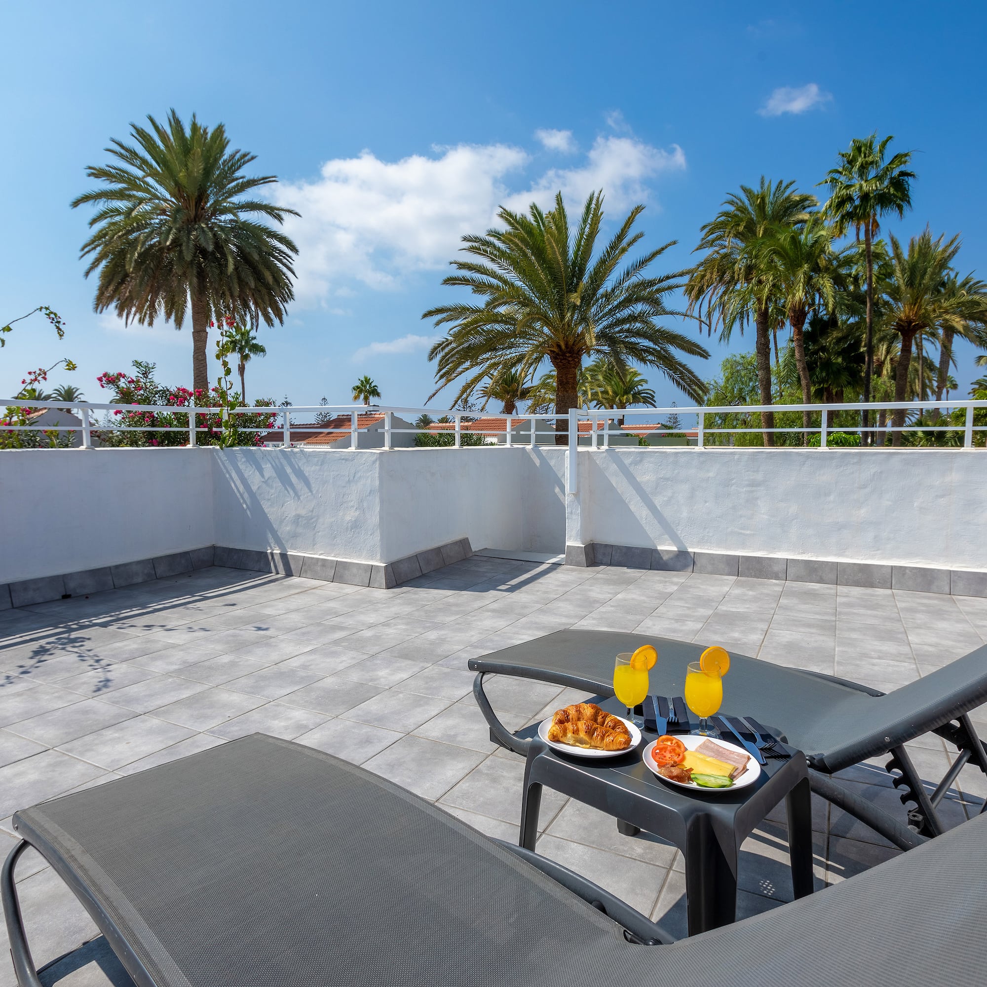 a table with food on it on a patio
