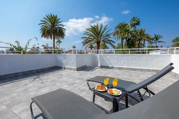 a table with food on it on a patio