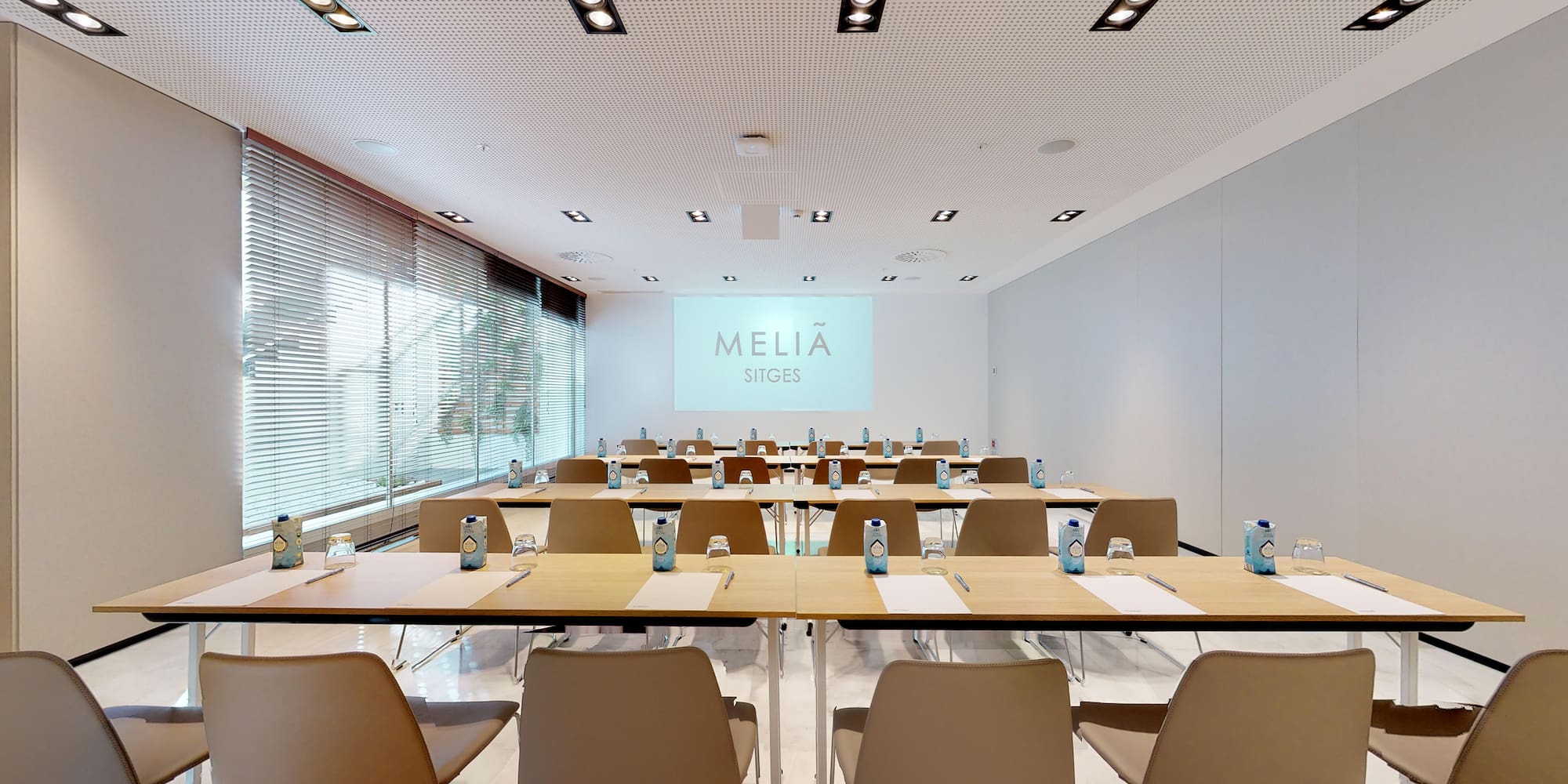 a room with tables and chairs
